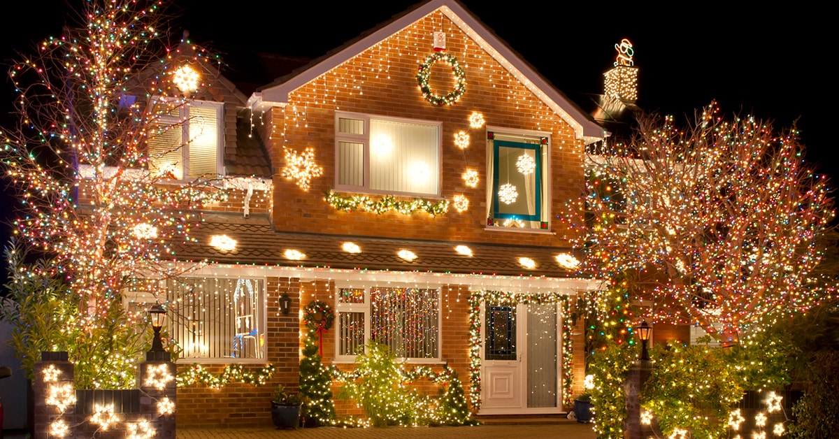 a christmas tree lit up at night